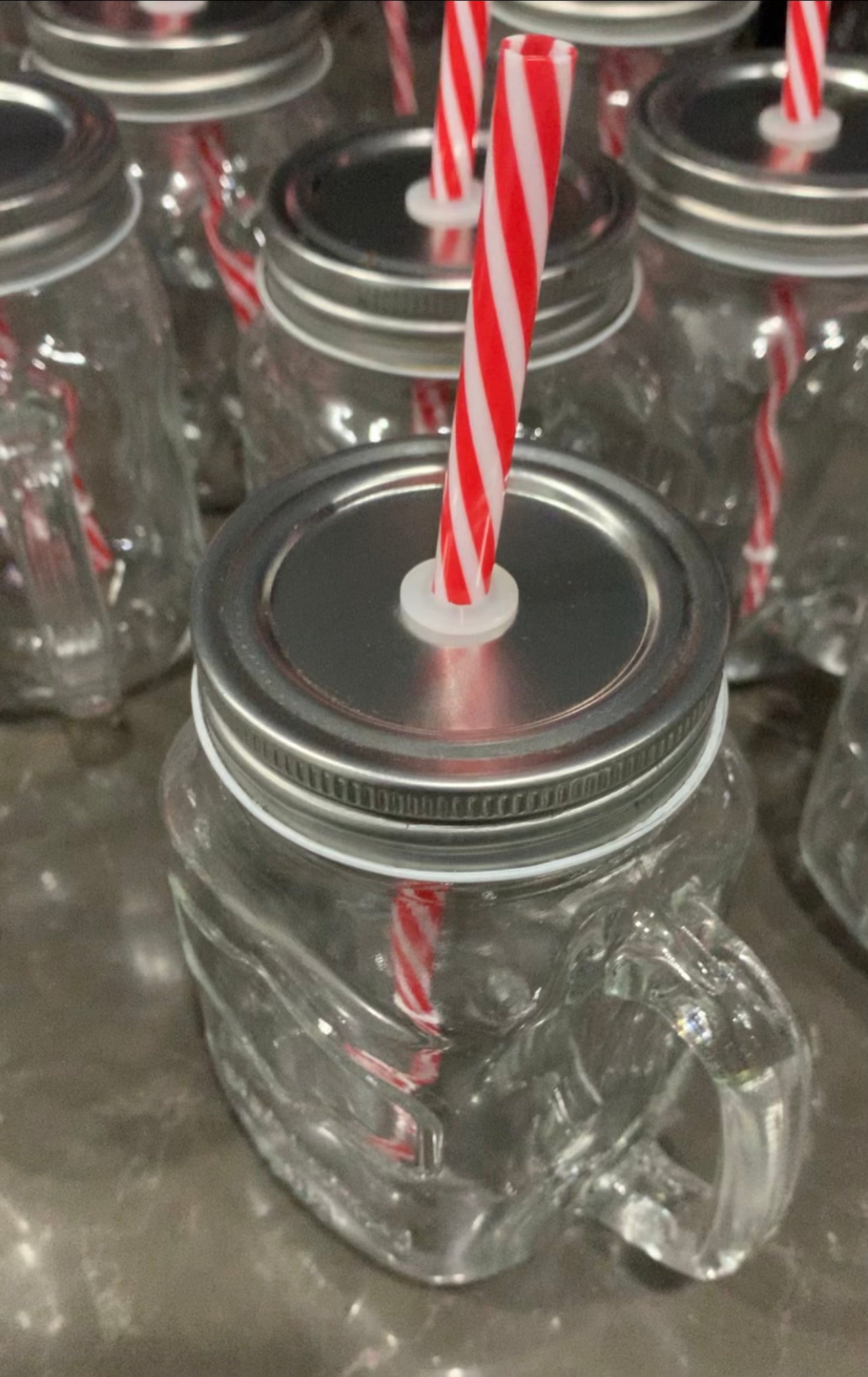 Glass Mason Drinking Jars with handle, metal screw on lid with red & white Straws Rockhampton Vintage Hire