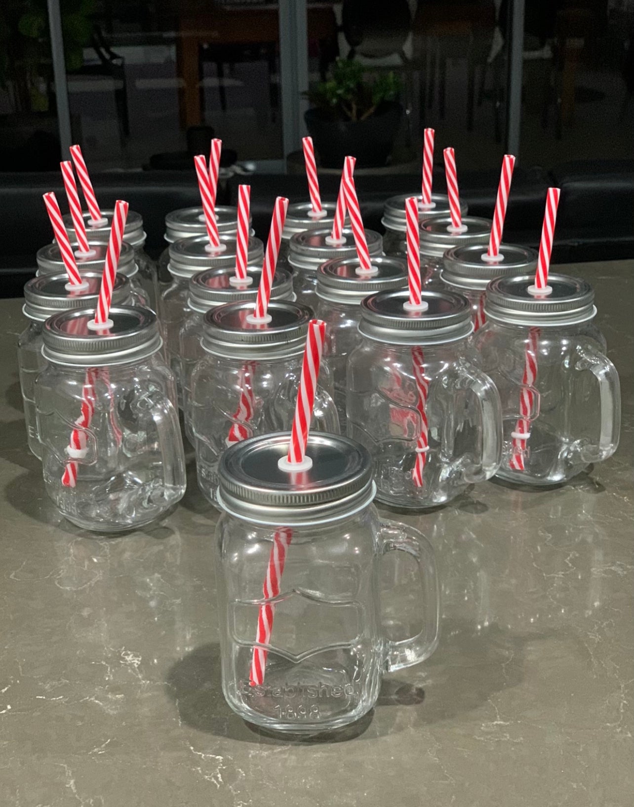 Glass Mason Drinking Jars with handle, metal screw on lid with red & white Straws Rockhampton Vintage Hire